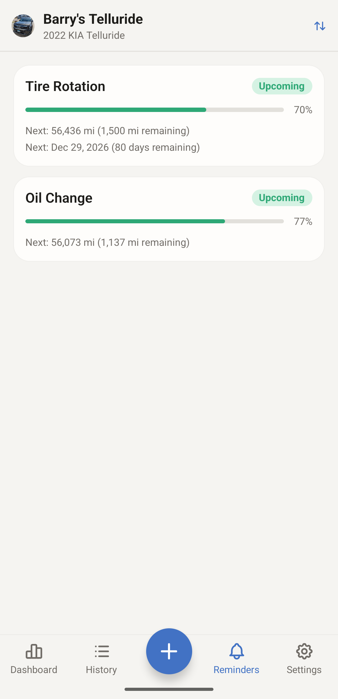 AutoMate Reminders screen with two cards. Tire Rotation is 70 percent of the way to due, with the next one at 56,436 miles or December 29, 2026. Oil Change is 77 percent of the way to due.